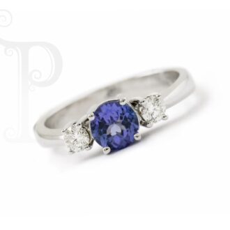 18k White Gold Tanzanite and Diamond Trilogy Ring